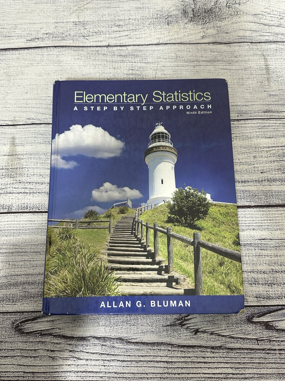 Elementary Statistics: A Step by Step Approach – Bluman, Allan – Hardcover -…