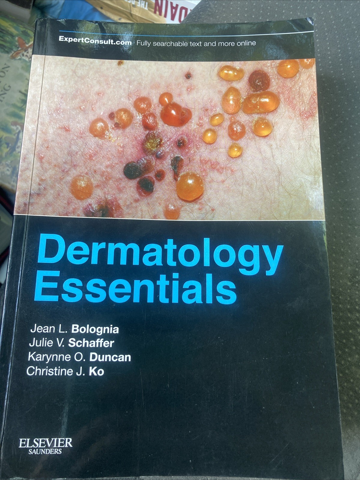 Dermatology Essentials, 1e – Paperback, by Bolognia MD Jean L.; – Good c